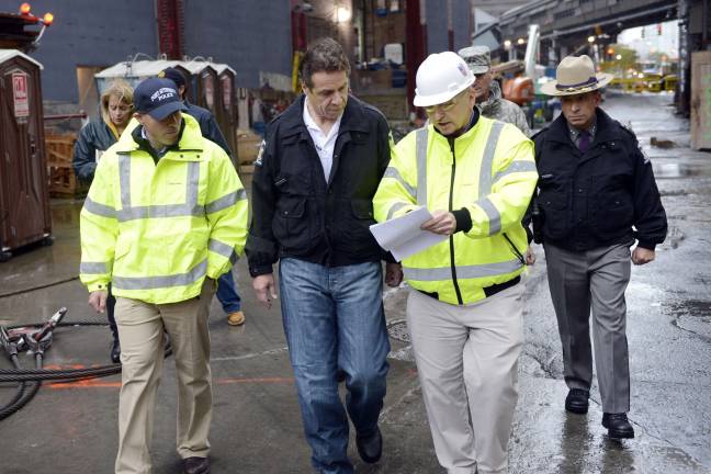 the big question Governor Andrew M. Cuomo receives briefing on fortification of World Trade Center site, on Oct. 29, 2012, the morning of Hurricane Sandy. Photo: Office of Gov. Andrew Cuomo, via flickr