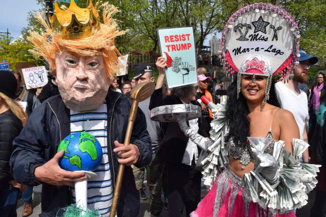 the politics of halloween Anti-Trump protesters wore eye-catching costumes in response to Trump’s visit to the Intrepid in May. Photo: Michael Garofalo