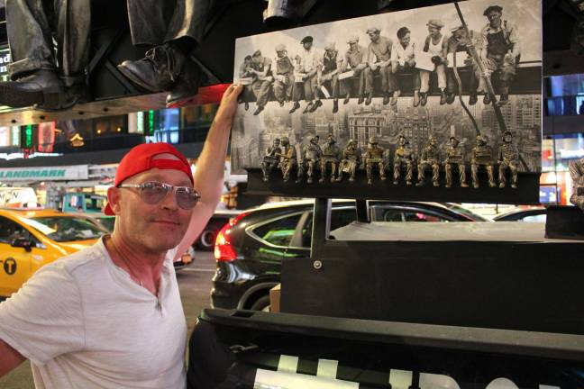 capturing, and saluting the city’s past Sergio Furnari with his sculpted replica of Charles Ebbets's photograph. Photo: Rose Lytle