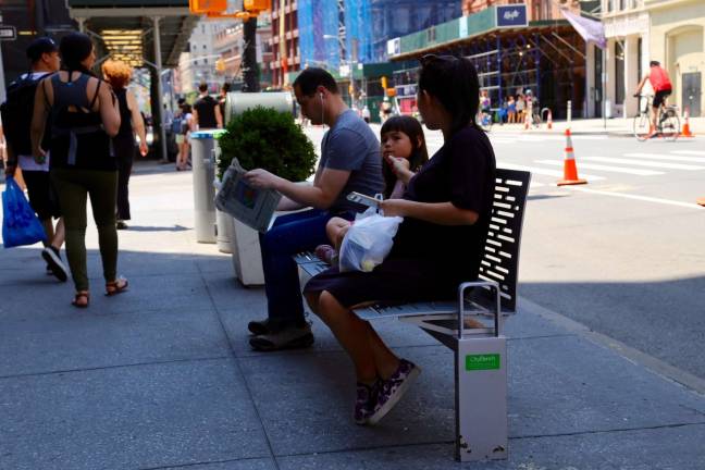 THE BENCHING OF MANHATTAN More than 500 CityBenches are expected to be in place by the end of next year. Photo: NYC DOT