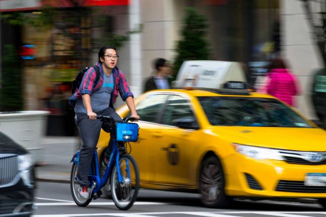 the age of the bike controversy On Fifth Avenue. Photo: Doug Davey, via flickr