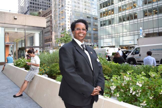 some like it cold Cheryl Pennant stands in a garden area of the office building where she is a security officer. Photo: Genia Gould