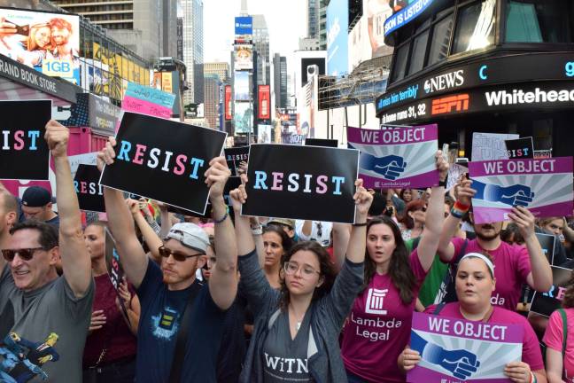 Hundreds of protesters assembled in Times Square Wednesday in response to President Trump&#x2019;s announcement of a ban on transgender military service. Photo: Michael Garofalo