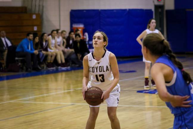 Sweet Victory Tori-May Della Pace scored her 1,000th career point in her senior season and led the Loyola School Lady Knights to the NYCAL championship. Photo: Mark Wyville