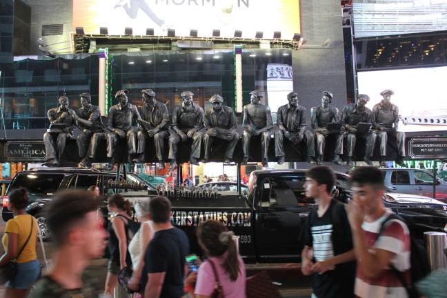 capturing, and saluting the city’s past Sergio Furnari's sculpted replica of Charles Ebbets's photograph, "Lunch atop a Skyscraper." Photo: Rose Lytle