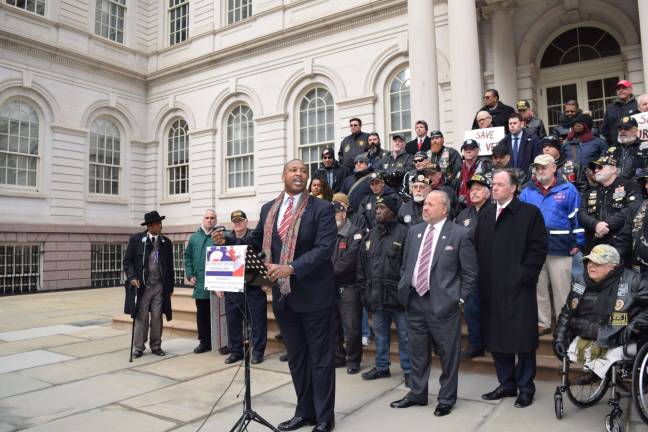 Fighting for Vets Mayoral candidate Michel Faulkner addresses veterans and the media at city hall on Feb. 1 at a rally to oppose the decreased funding in the proposed budget for the Department of Veterans Services. Photo: Razi Syed