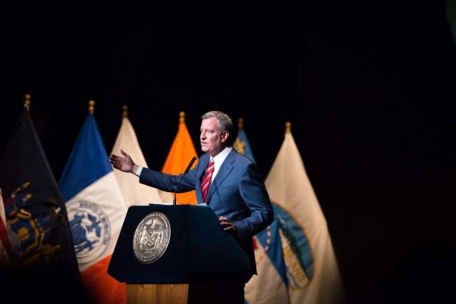 Reaching out to new yorkers Mayor Bill de Blasio delivers his State of the City address at the Apollo Theater on Monday. Photo: Edwin J. Torres/Mayoral Photography Office