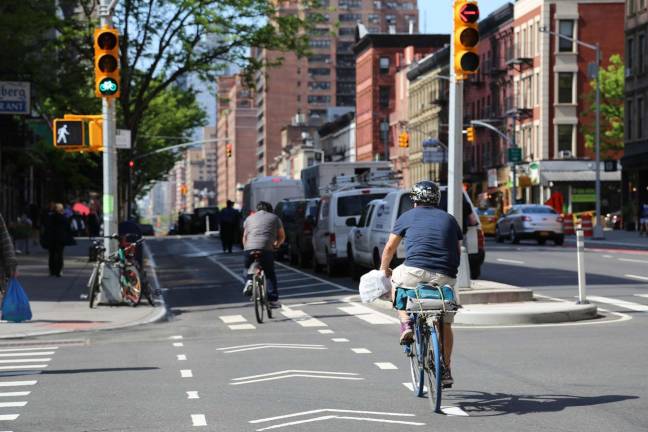 Time to protect cyclists on our crosstown streets The Second Avenue Subway Transit Garden on the Upper East Side, configured earlier this year, includes a protected bike lane. Photo: New York Department of Transportation