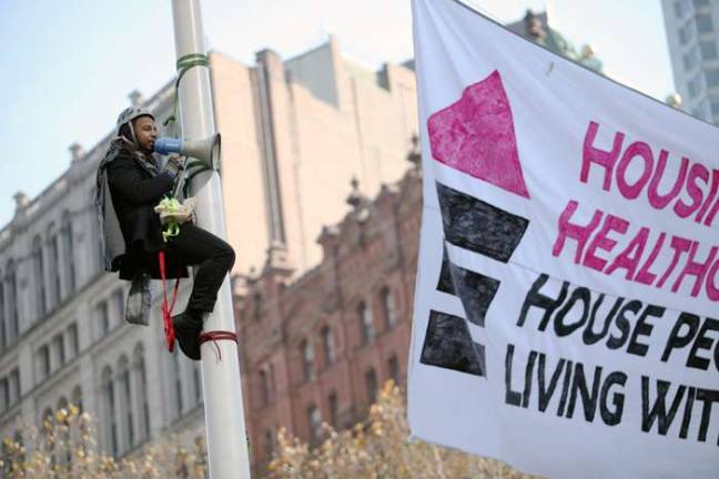 AIDS Activists Climb Flagpoles At City Hall AIDS Activists Climb Flagpoles At City Hall