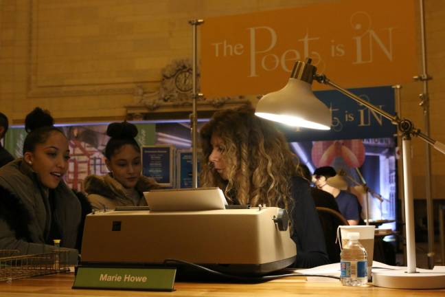 the lyrical everyday Poet Marie Howe crafts customized verses for Talia, 18, left, and Jocsan, 17, students from CUNY Prep in the Bronx. Photo: Katherine Warren