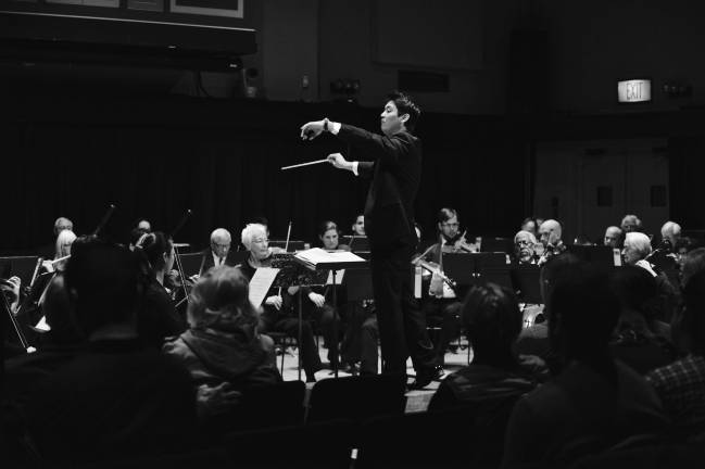bridging generations through music Music director Tomo Matsuo conducting the 92Y Orchestra. Photo: Ed Panganiban