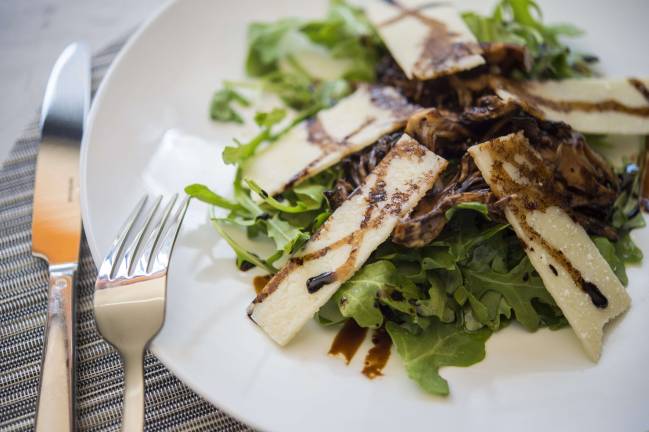 Best of manhattan 2016 Grilled-hen-of-the-woods mushrooms on a plate at Freds Madison Avenue