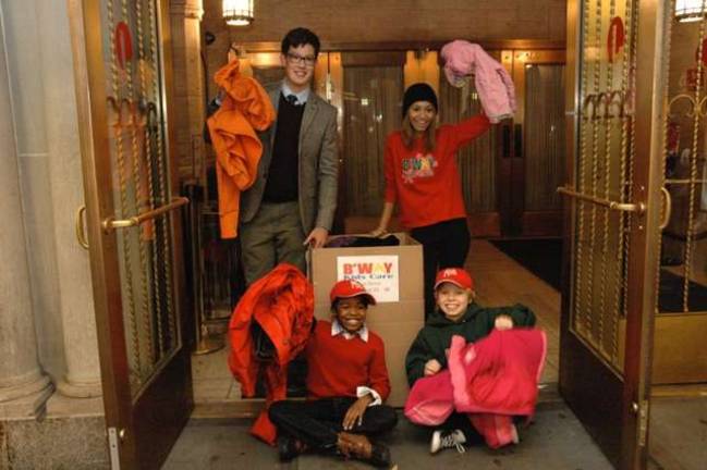 Putting WArmth into the Holidays "Kinky Boots" cast members participating in the Broadway Coat Drive. Photo: www.mickeypantanophotography.com