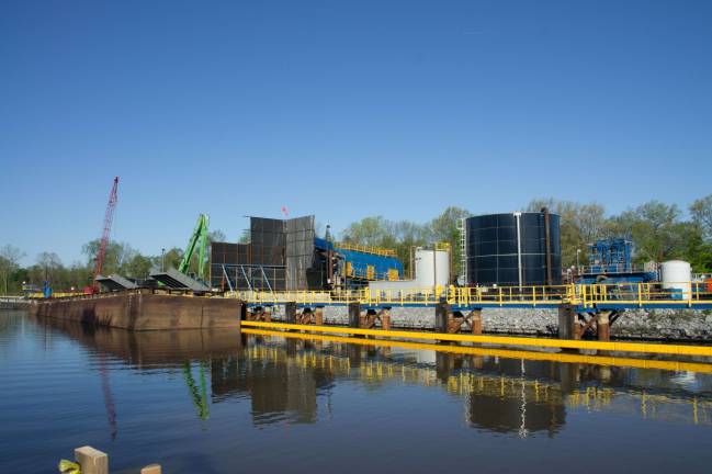 state, feds bicker about hudson's health General Electric's dredging project in Upper Hudson River in 2012. Photo: Peretz Partensky, via Wikimedia Commons.