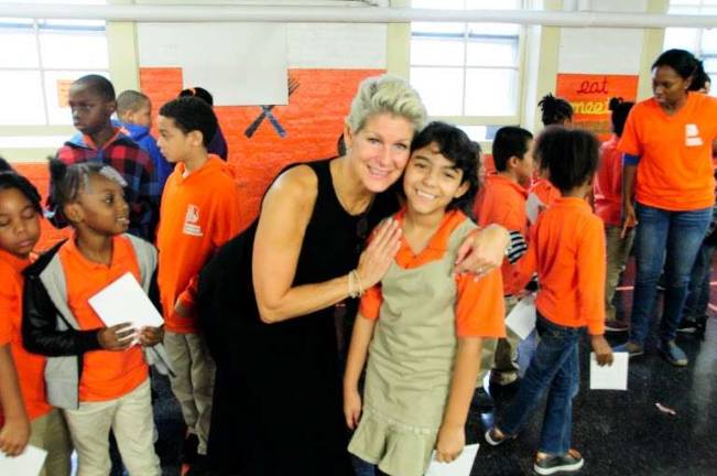 Enriching education Louise Phillips Forbes, a board member of Change for Kids, at Brooklyn Landmark Elementary School in 2014. Photo: Courtney Lamb