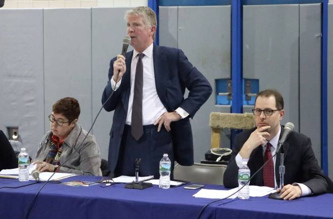 putting hate on trial Manhattan District Attorney Cyrus Vance (standing) explained his office’s response to the recent increase in reported hate crimes at a community event March 23. Photo: Michael Garofalo