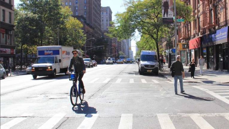 Op-Ed: For A Safer Amsterdam Avenue A bicyclist rides up Amsterdam Avenue, near at 78th Street. Photo: New York City Department of Transportation