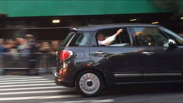 francis’ visit bittersweet to Parishioners of CLosed Churches News Pope Francis waving to crowds in Manhattan. Photo by Heather Stein