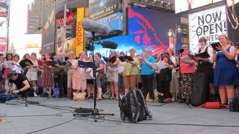 Hundreds Sing Philip Glass in Times Square