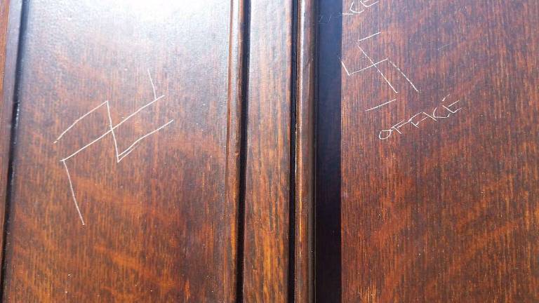 Swastikas carved into door of Upper West Side church Two swastikas and the word "race office" on the front door of the Fourth Universalist Society on the Upper West Side. Photo: Rev. Schuyler Vogel