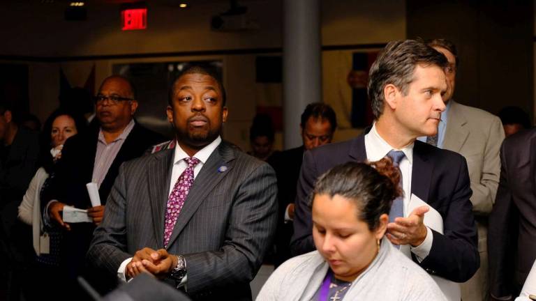 celebrating the building service worker award winners State Senator Brian Benjamin (center-left) and State Senator Brad Hoylman (right). Photo: Preston Ehrler/prestonehrler.com