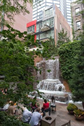 It sure doesn't look like midtown Manhattan. But this roaring 25-foot waterfall is the centerpiece of Greenacre Park on East 51st Street, which was just added to the National Register of Historic Places. Photo: Courtesy of Greenacre Foundation / Howard Jay Heyman It sure doesn't look like midtown Manhattan. But this roaring 25-foot waterfall is the centerpiece of Greenacre Park on East 51st Street, which was just added to the National Register of Historic Places. Photo courtesy of Greenacre Foundation / Howard Jay Heyman