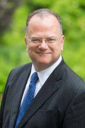 James G. Clynes served 12 years on the board of Community Board 8, the last three at the helm, before his election last year to a 12-year term as a Civil Court judge. Photo: New York York State Unified Court System