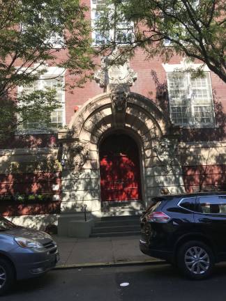 P.S. 290 on East 82nd Street, where more than 600 elementary school students have nowhere to play but the street. Parents and elected official want the city to develop the rooftop as a safe space for recess, exercise and other physical activities. Photo: Douglas Feiden