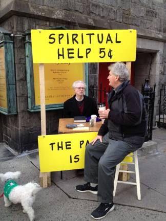 Pastor Gregory Fryer of Immanuel Lutheran Church shares coffee and counsel, as he does on occasional Tuesday mornings outside the East 88th Street church. Photo: Rick Sayers