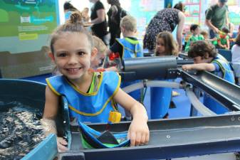 Kids learn about water &#8212; and get up close &#8212; at a summertime exhibit. Photo courtesy of the Children's Museum of Manhattan