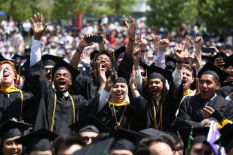 Whereas 60 percent of adults in Manhattan have earned at least a bachelor's degree, only one-third of adults in Brooklyn, Queens and Staten Island have done so. The rate is just 19 percent in the Bronx. Pictured, Graduating students cheering at the 2017 City College of New York commencement. Photo: CUNY Office of Communications and Marketing