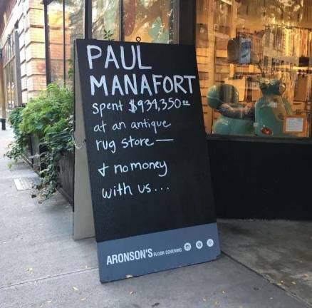 A sign outside of Aronson's Floor Covering on West 17th Street in November. Photo: Ryder Kessler