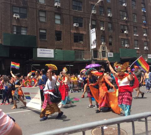 Members of the Indonesian LGBT Society of New York donned traditional clothing and carried pride flags through the parade route. Photo: Natasha Roy 