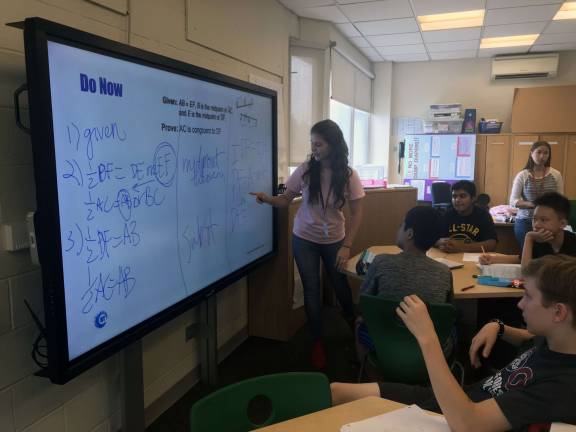 Ella Scholz, teaching fellow and a junior at Brown University, teaches ninth grade geometry at Breakthrough New York.&#xa0;Photo: Christina Cardona