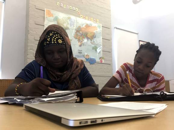 Mariamu Conteh (left), 13, is an eighth grade student at P.S. 123. She&#x2019;s a participant at Breakthrough New York and wants to be a neurosurgeon when she grows up. Photo: Christina Cardona