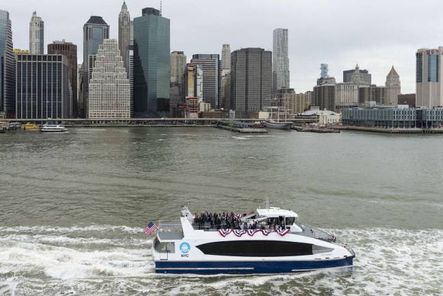 You won't see this on the Hudson River. A northbound NYC Ferry boat zips up the East River across from Fulton Street and the South Street Seaport downtown. Photo: NYC Economic Development Corp.