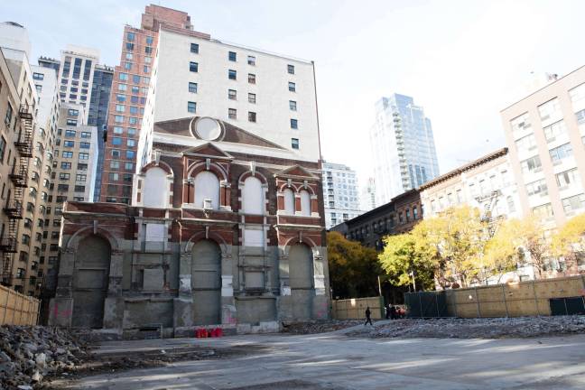 A seven-story vestige of an old Yorkville chapel, embedded into a neighboring building, stands sentinel over an empty lot where the Spence School is constructing a new athletic complex. When completed, the facade will no longer be visible. Photo: Sarah Greig Photography / FRIENDS of the Upper East Side Historic Districts