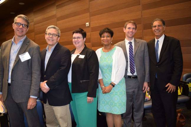 Panelists with Editor in Chief Kyle Pope, left.
