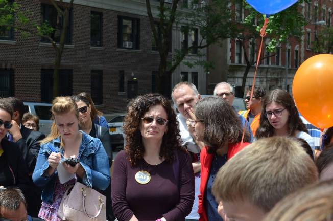 Dana Lerner cries as Jacob Hume talks about her son, Cooper Stock, who was killed by a reckless cab driver last January. Hume and Stock were friends and classmates at the Calhoun School on the Upper West Side. Photo by Daniel Fitzsimmons.